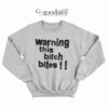Kim Lip Warning This Bitch Bites Sweatshirt